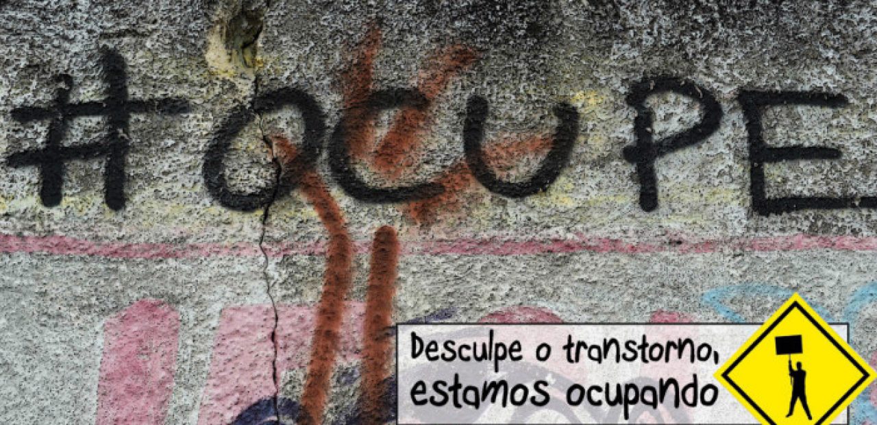 Grafites no muro que cerca o Cais José Estelita, no centro do Recife, convocam para o movimento.